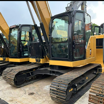 کاترپیلار CAT 310 استفاده شده برای جابجایی چوب، بیل مکانیکی چرخشی هیدرولیکی